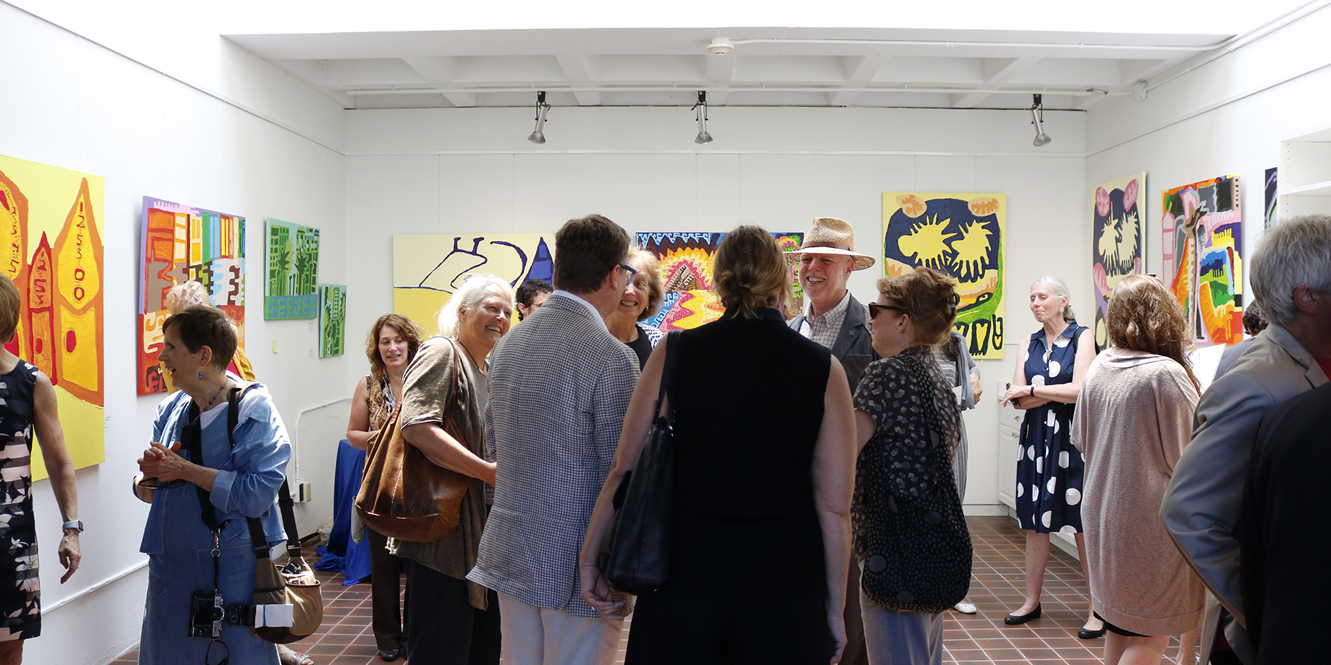 Visitors at the opening of an Open Door Gallery exhibition by Dominic Killiany
