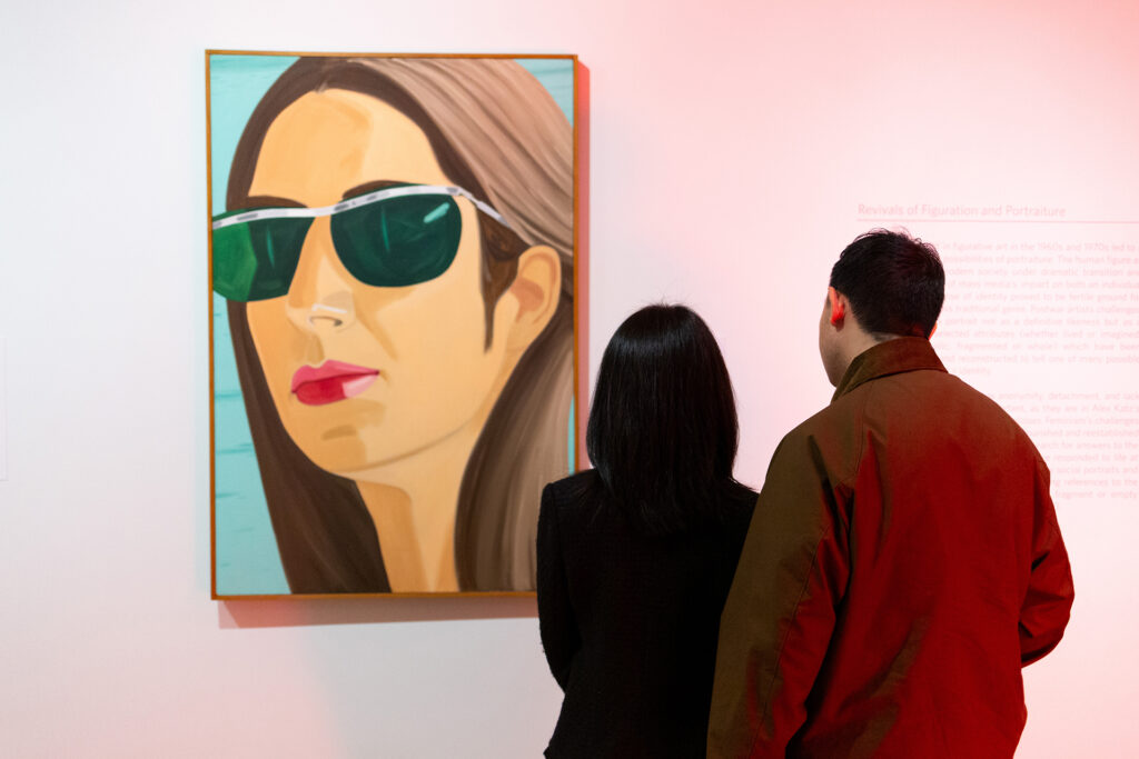 Visitors viewing a painting by Alex Katz