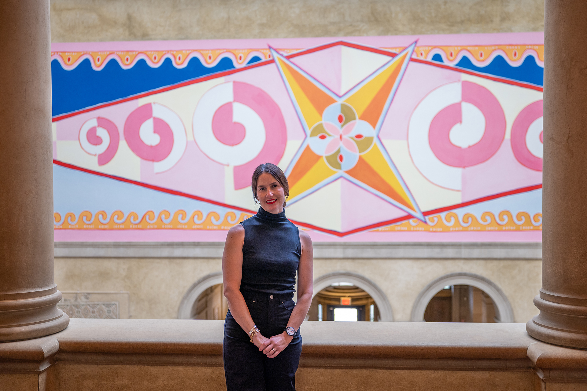 Artist Crystalle Lacouture with her work 'Correspondence (for Elizabeth Bishop)' in the background