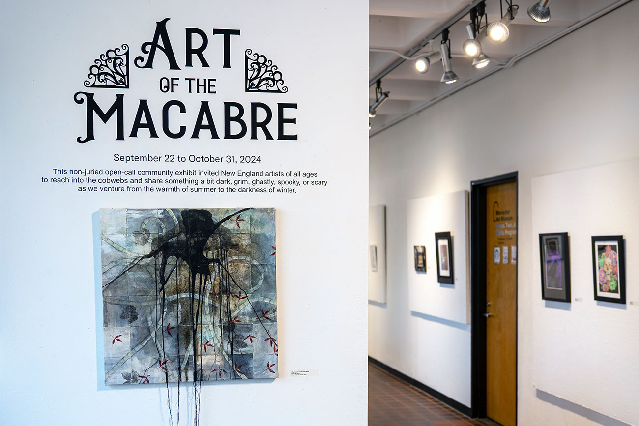 View of 'Art of the Macabre' exhibition logo and works on display