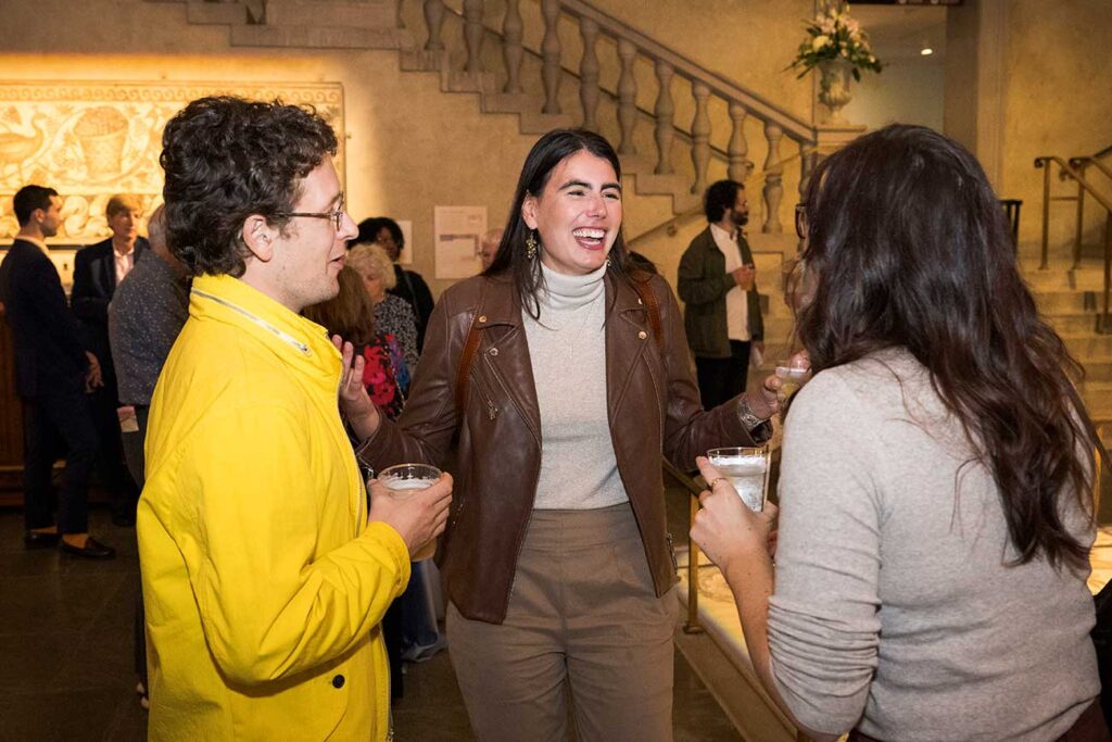 A group of friends enjoy an After Hours event in Renaissance Court